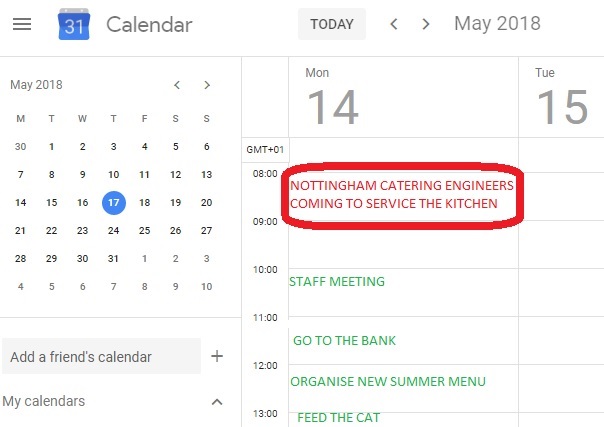 Engineer servicing commercial kitchen equipment